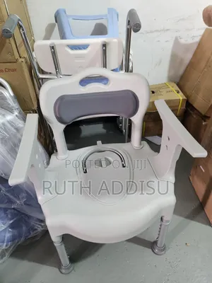Stationary, Modular Shower and Commode Chair. It Features a Detachable