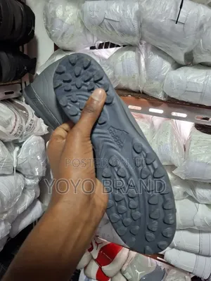 Adidas Football Boots in a Dark Gray