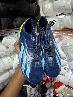 Adidas Football Boots in a Dark Blue/Yellow