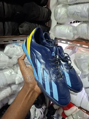 Adidas Football Boots in a Dark Blue/Yellow