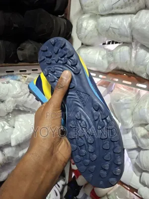 Adidas Football Boots in a Dark Blue/Yellow