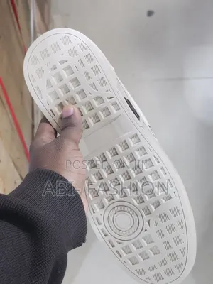 Louis Vuitton Shoes Feature a Cream-Colored