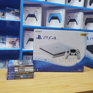 PlayStation 4 Slim Brand New and 2 Original Controller