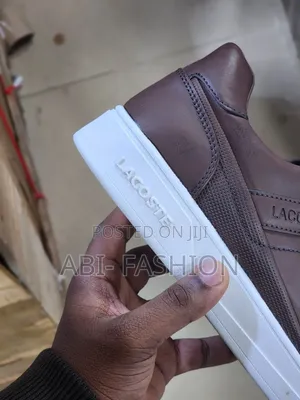 Lacoste Men's Sneakers Feature Rich Brown