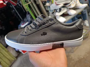 Lacoste Casual Sneakers Feature a Dark Gray Rubber Sole