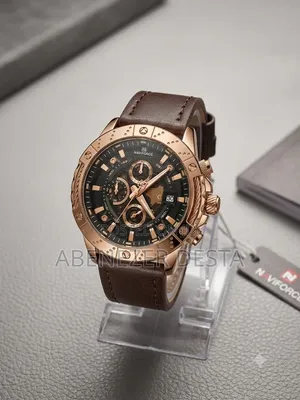 Naviforce Watch Featuring a Rose Gold Case and a Brown Leather