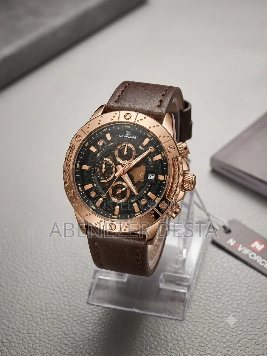 Naviforce Watch Featuring a Rose Gold Case and a Brown Leather