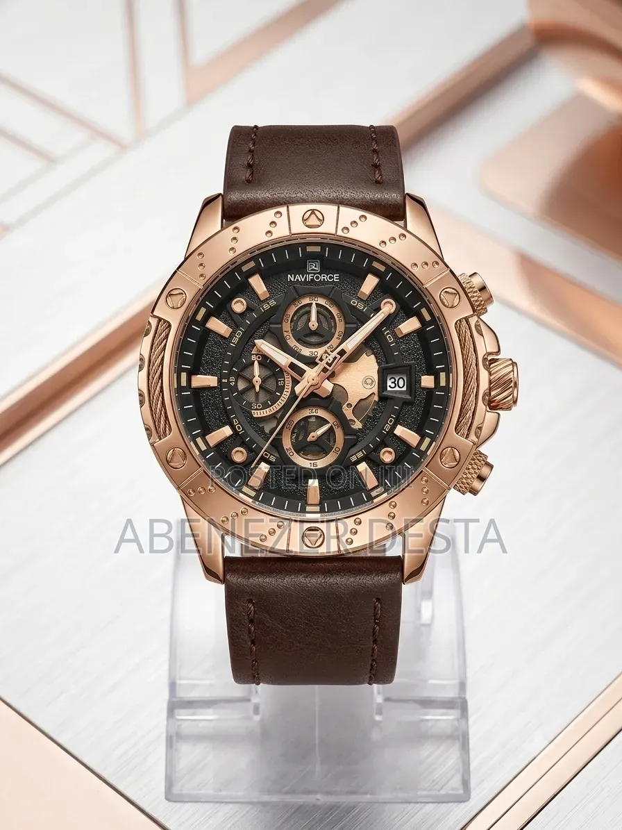 Naviforce Watch Featuring a Rose Gold Case and a Brown Leather