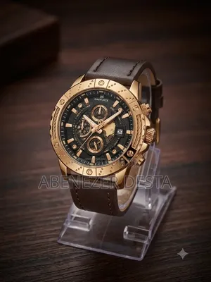 Naviforce Watch Featuring a Rose Gold Case and a Brown Leather