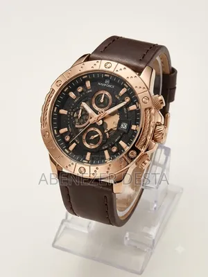 Naviforce Watch Featuring a Rose Gold Case and a Brown Leather
