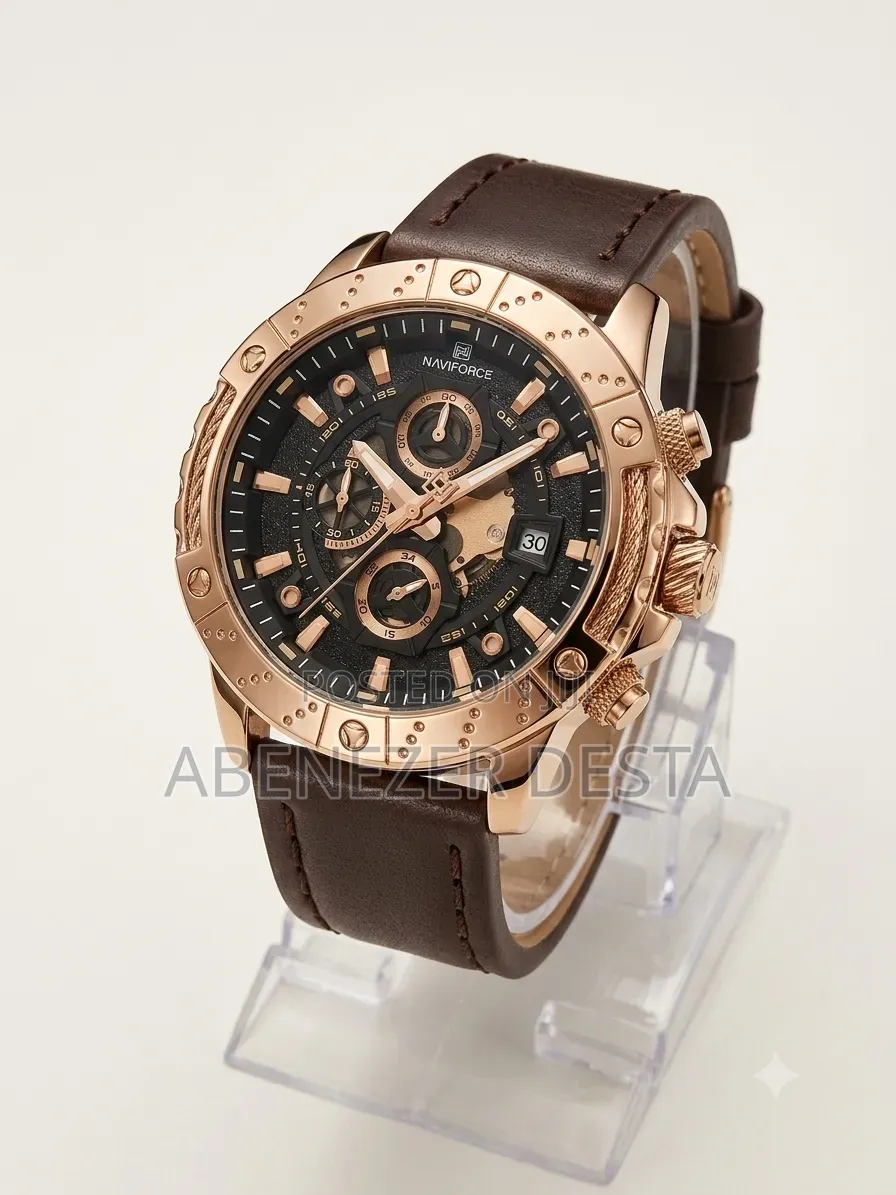 Naviforce Watch Featuring a Rose Gold Case and a Brown Leather