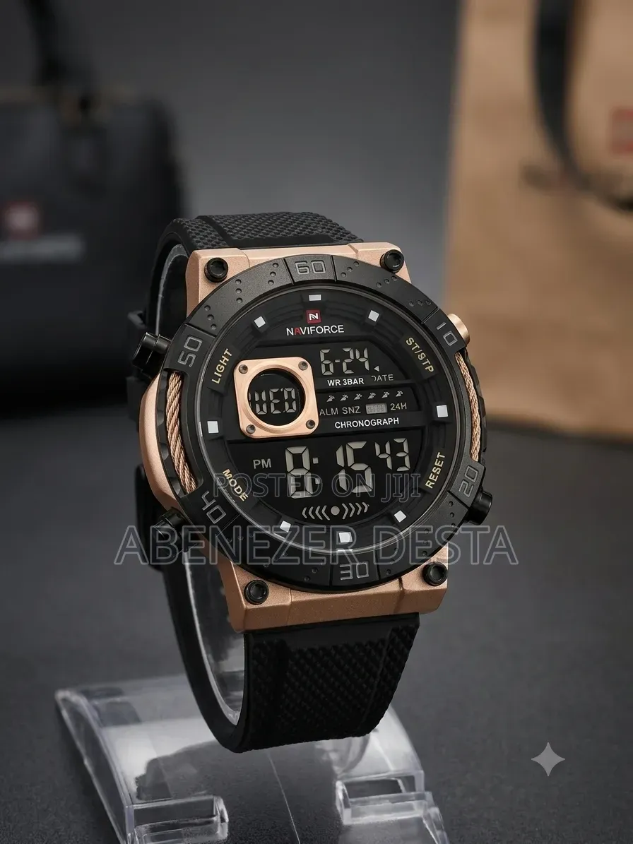 Naviforce Digital Watch With a Rose Gold Case and Black Silicone Band.