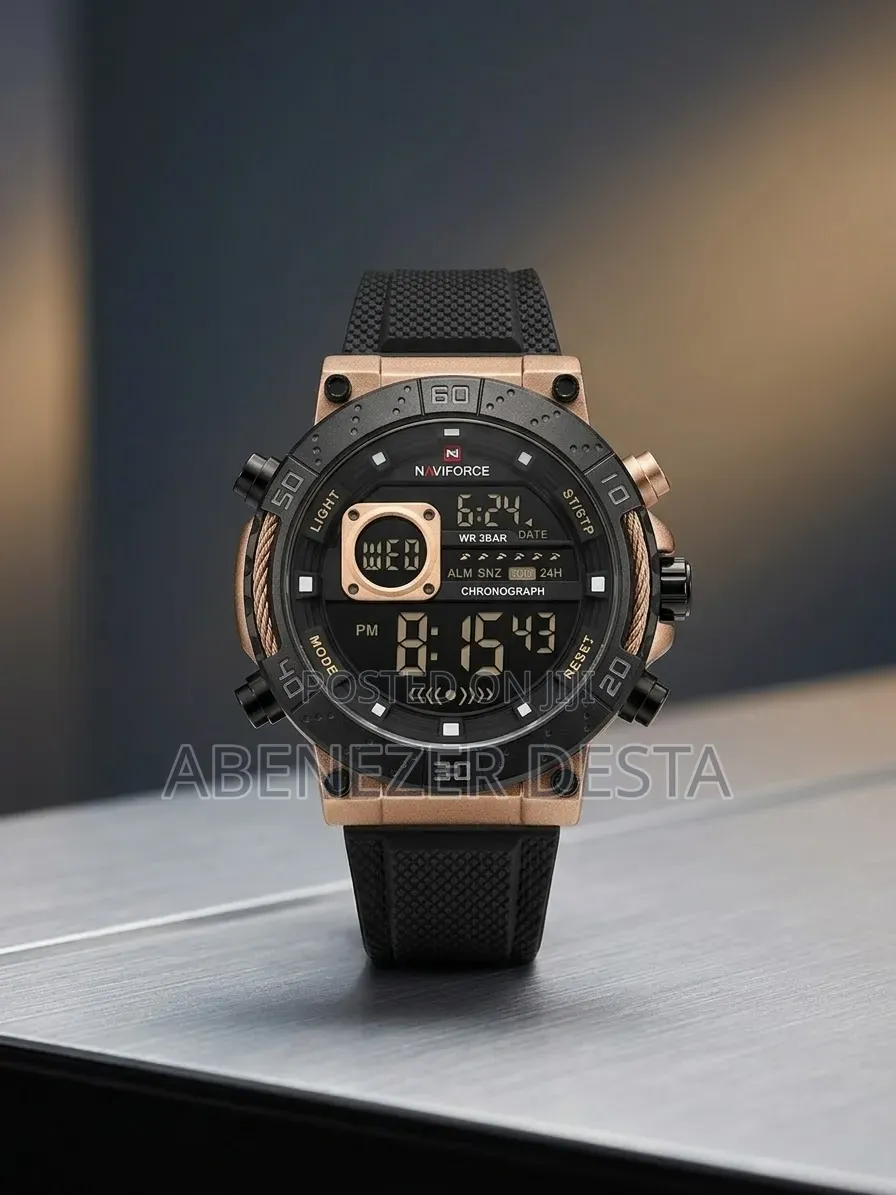 Naviforce Digital Watch With a Rose Gold Case and Black Silicone Band.