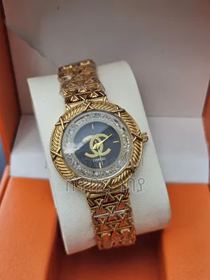 Designer Style Round Watch Crystal Bezel Black Logo Dial Gold Tone