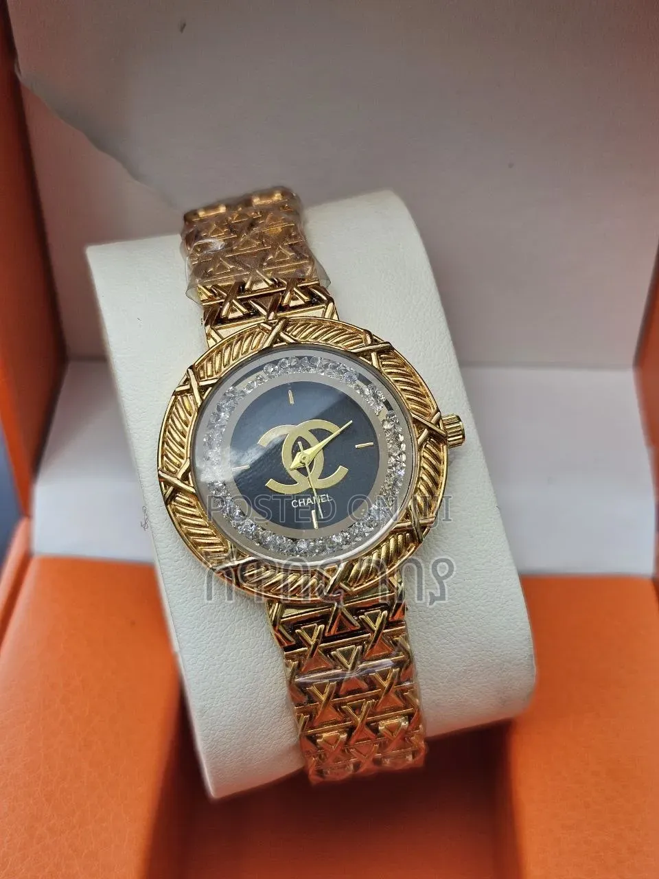 Designer Style Round Watch Crystal Bezel Black Logo Dial Gold Tone