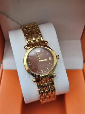 Designer Style Round Watch Brown Dial Gold Ridged Bezel Ribbed Band