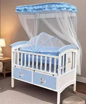Portable Wooden Baby Crib Featuring Built-in Storage