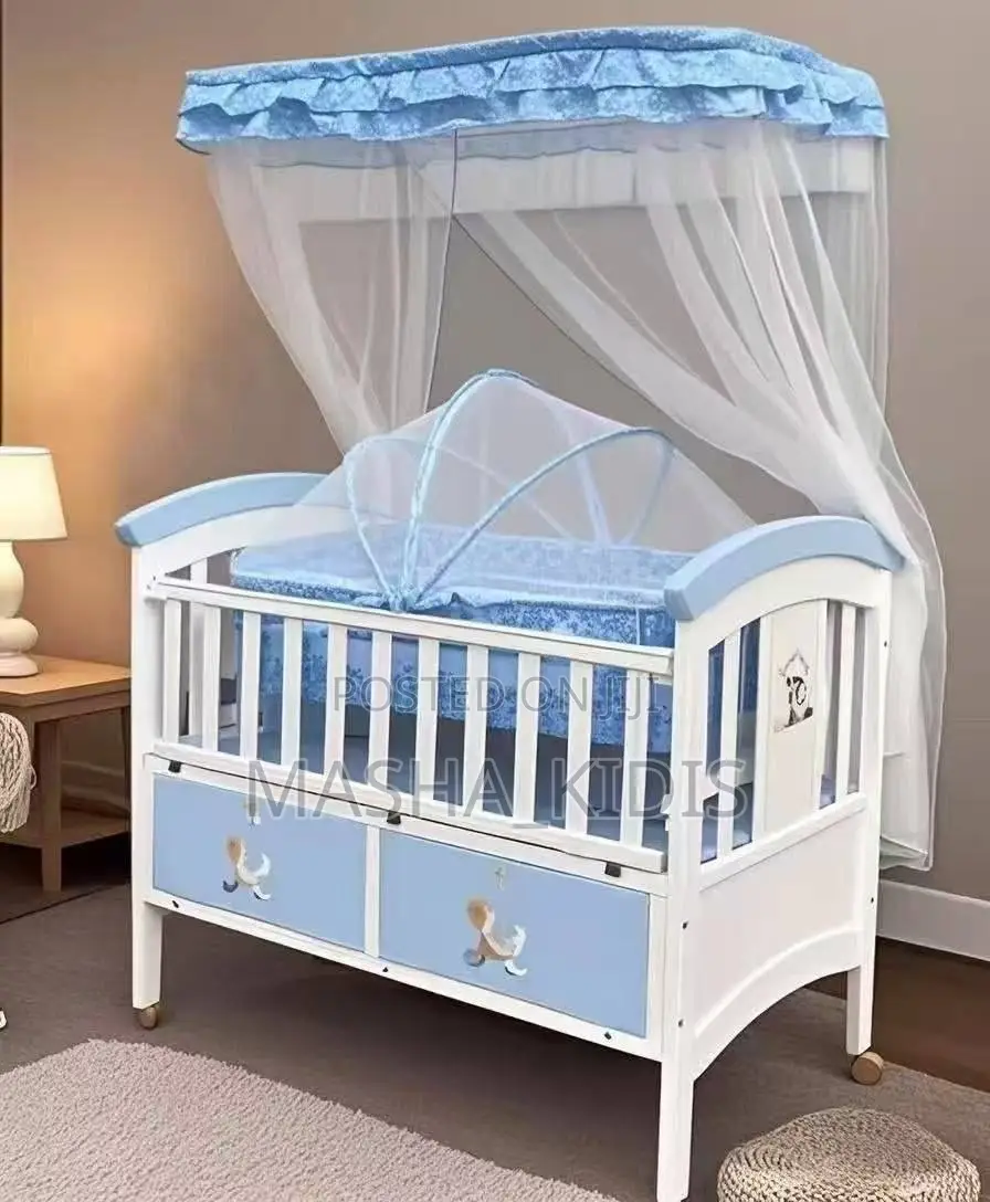 Portable Wooden Baby Crib Featuring Built-in Storage