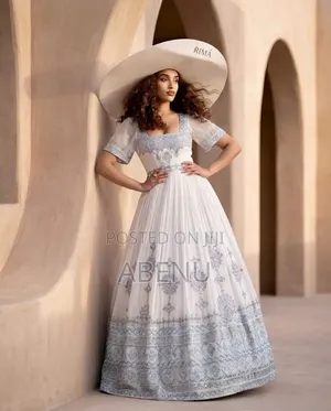 Elegant White Silver Habesha Kemis With Timeless Embroidery