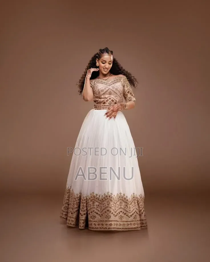 Elegant White Gold Habesha Kemis – Traditional Ethiopian Dress