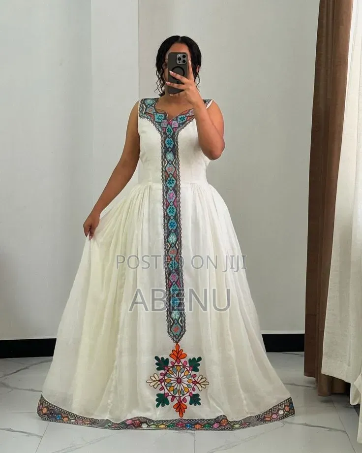 Elegant White Habesha Kemis With Colorful Traditional Tibeb Embroidery