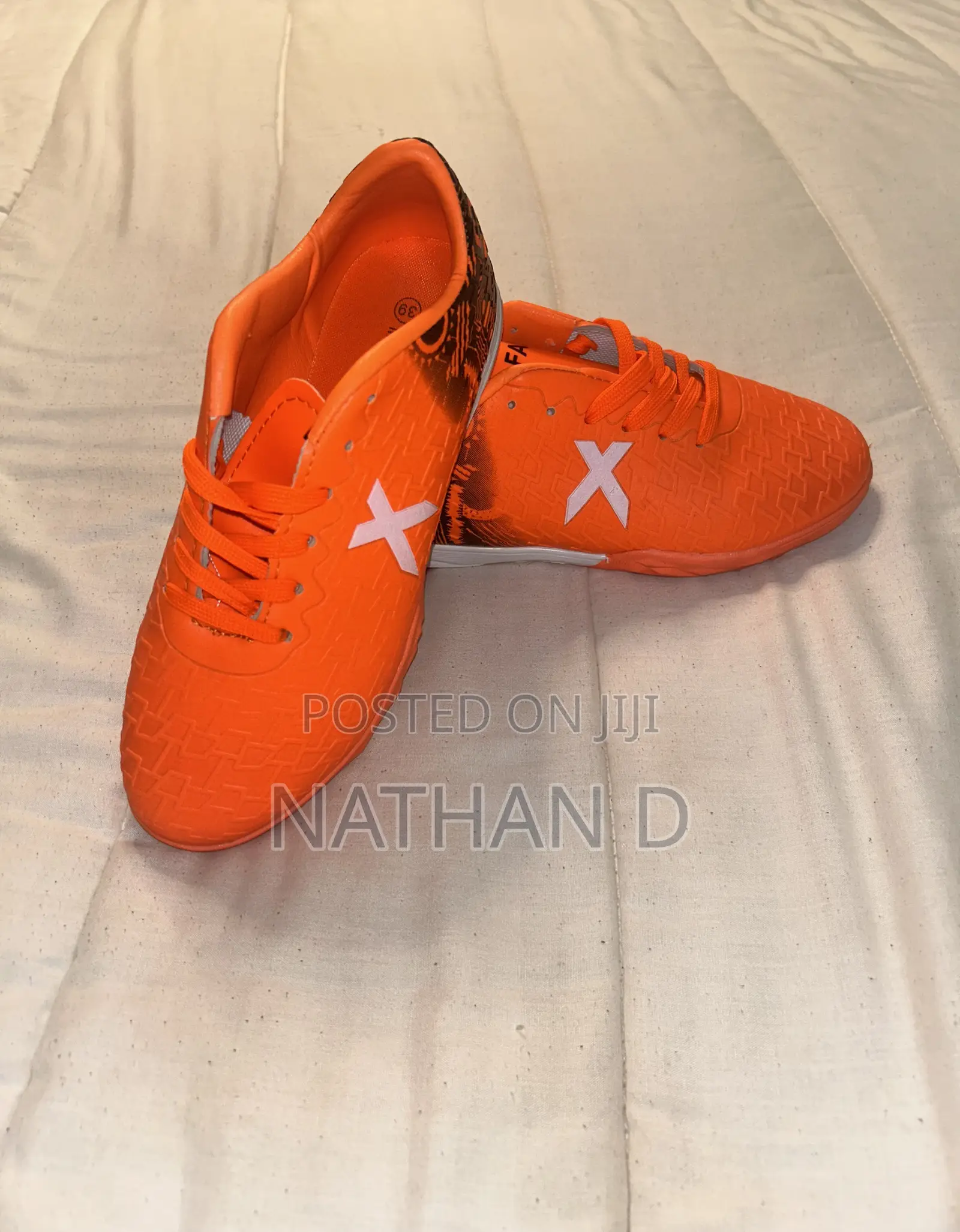 Orange Cleats/ Taketa