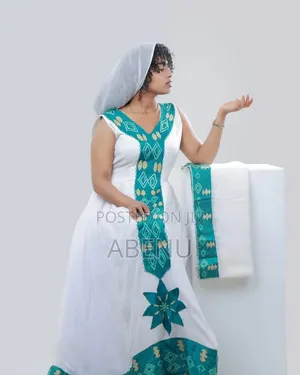 Elegant White Teal Habesha Kemis With Traditional Tibeb