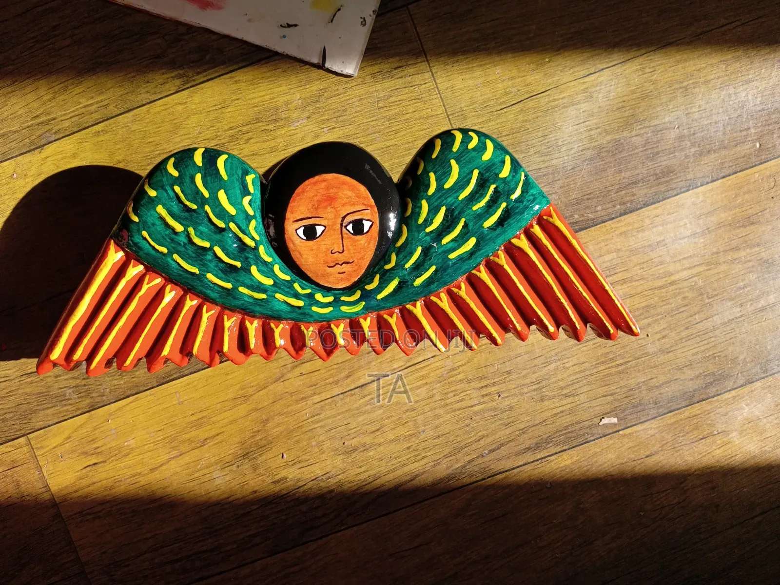 Handcrafted Ethiopian Angle Art on Wood