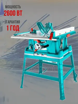 TOTAL TS526043 Industrial Table Saw With a Turquoise Housing.