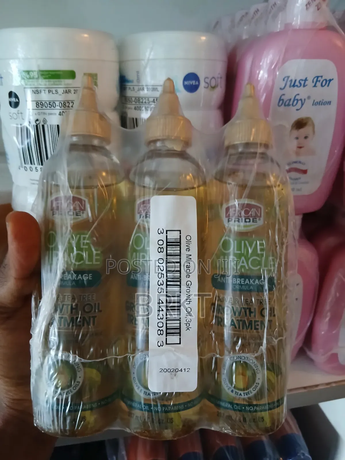 የአፍሪካን ፕራይድ የፀጉር ማሳደጊያ ዘይት (African Pride Olive Tea Tree Growth Oil)