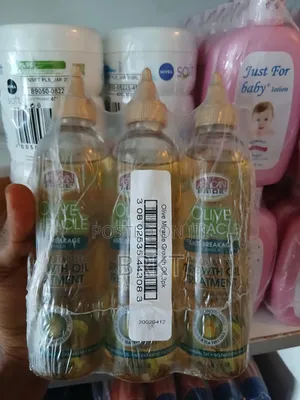 የአፍሪካን ፕራይድ የፀጉር ማሳደጊያ ዘይት (African Pride Olive Tea Tree Growth Oil)