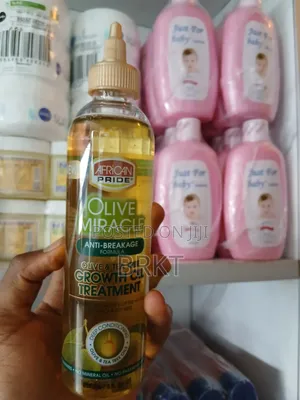 የአፍሪካን ፕራይድ የፀጉር ማሳደጊያ ዘይት (African Pride Olive Tea Tree Growth Oil)
