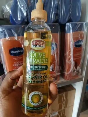 የአፍሪካን ፕራይድ የፀጉር ማሳደጊያ ዘይት (African Pride Olive Tea Tree Growth Oil)