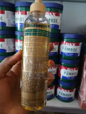 የአፍሪካን ፕራይድ የፀጉር ማሳደጊያ ዘይት (African Pride Olive Tea Tree Growth Oil)