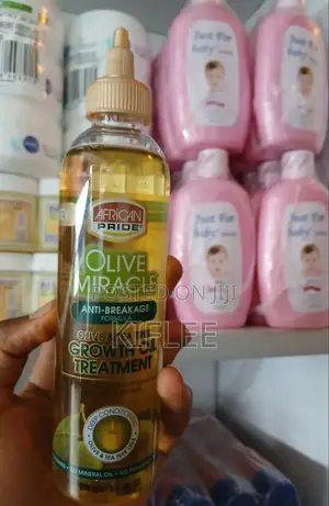የአፍሪካን ፕራይድ የፀጉር ማሳደጊያ ዘይት (African Pride Olive Tea Tree Growth Oil)