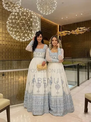 Elegant White Silver Ethiopian Habesha Kemis Duo
