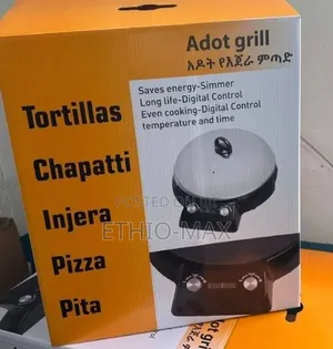 Adot Grill ( አዶት የእንጀራ ምጣድ )