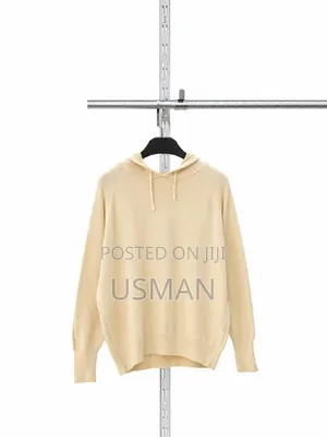 Unisex Cream Pullover Hoodie – Casual Style”