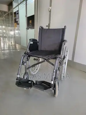 European Wheelchair峪宙armrests, Large Rear Wheels With Grey Tires