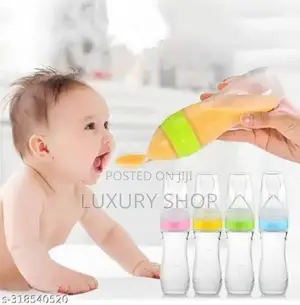 ባለ ማንኪያ ጡጦ feeding Bottell