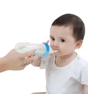 ባለ ማንኪያ ጡጦ feeding Bottell