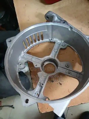 ,የጄነሬተር የኋላ ጫፍ ሽፋን / የስታተር መያዣ (Rear End Cover / Stator Housing) ነው