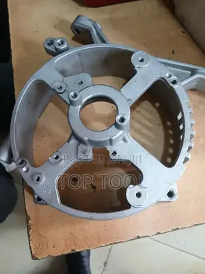 ,የጄነሬተር የኋላ ጫፍ ሽፋን / የስታተር መያዣ (Rear End Cover / Stator Housing) ነው