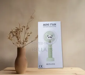 MINI FAN: Perfect Summer Companion.