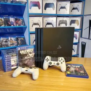 PS4 Pro Dubai Used – FC 26 + 5 Games