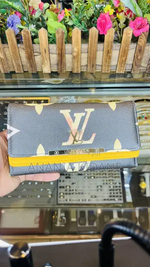 The Double Leather Wallet LV