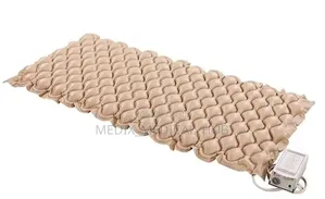 Anti-Decubitus Bubble Air Mattress With an Alternating Pressure Pump.