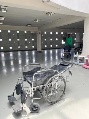 ጠንካራ የብረት ዊልቸር — Strong Metal Frame Wheelchair