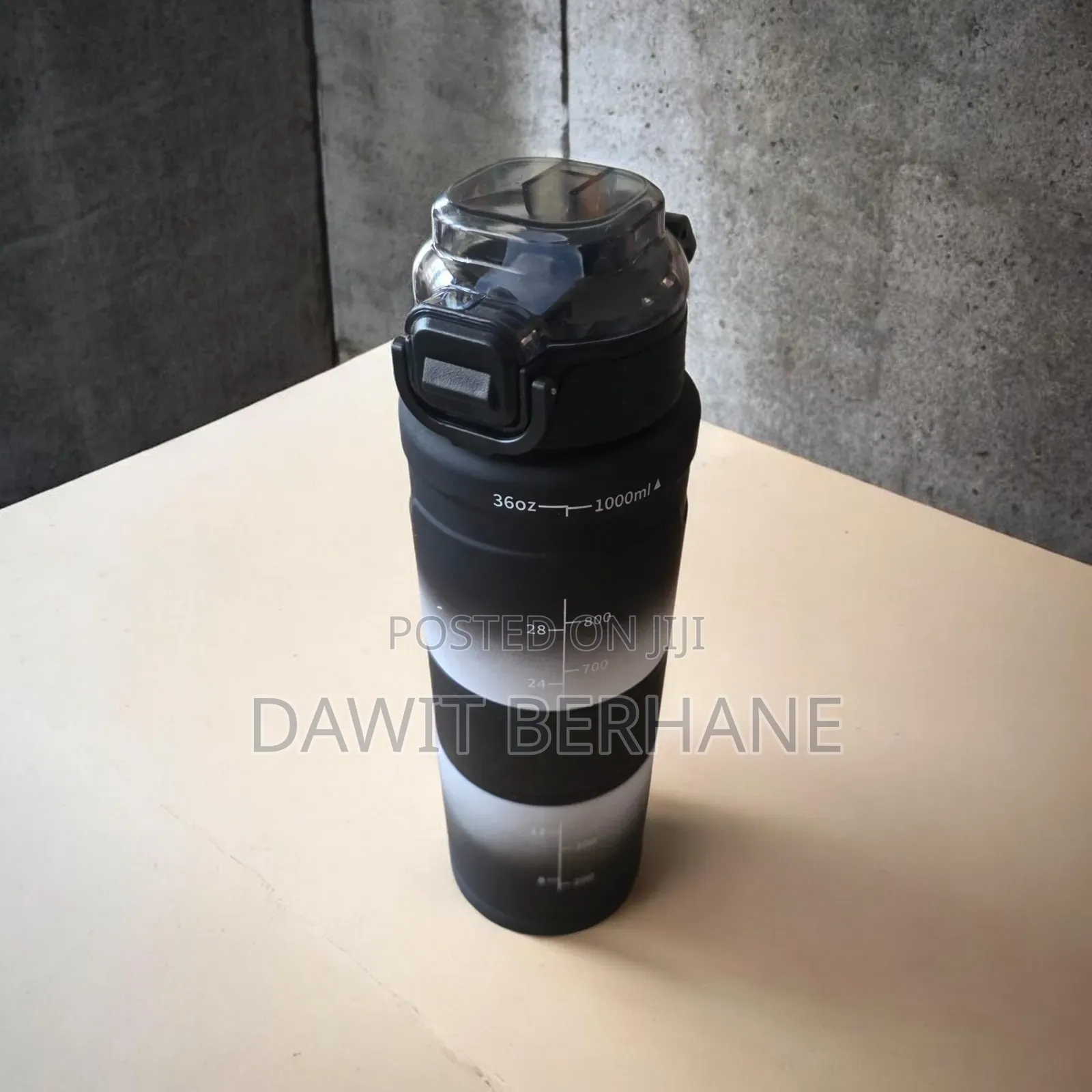1-Liter "Hello" Motivational Water Bottle With a Time Marker.