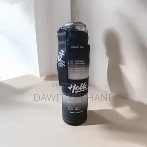 1-Liter "Hello" Motivational Water Bottle With a Time Marker.